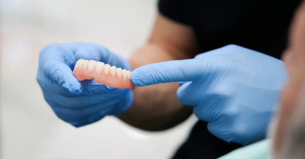 Will getting dentures stop gum disease